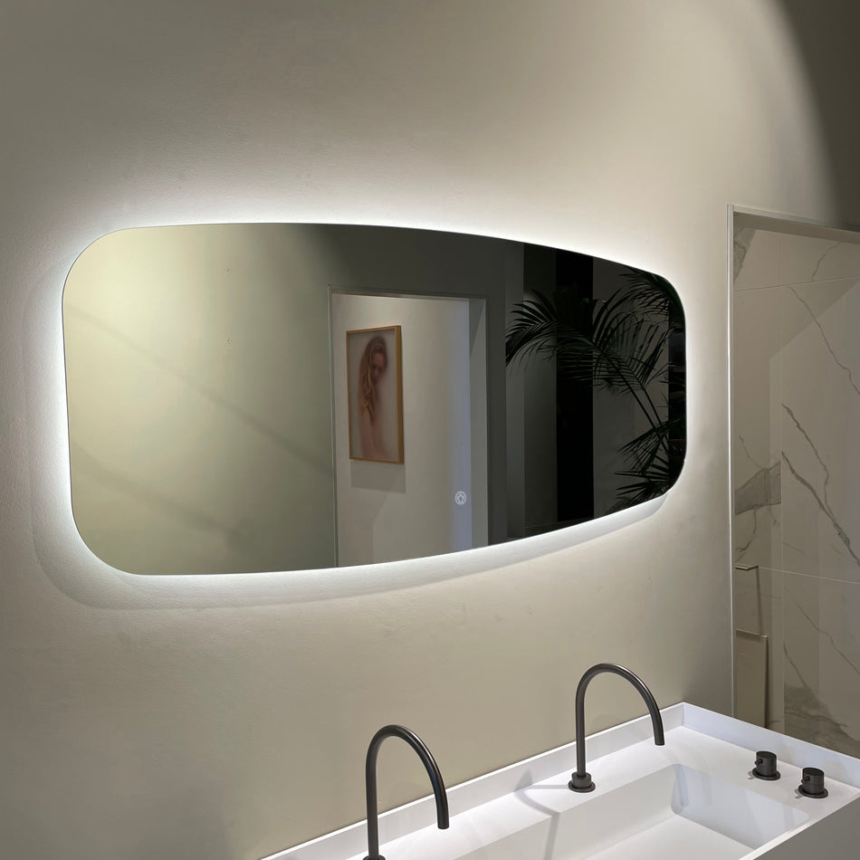 Simple oval horizontal mirror including lighting and heating